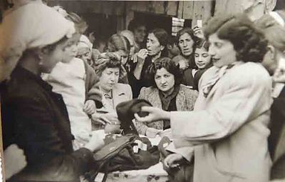 1949 Oct 1 AGBU Ladies Auxi distr cloths for Sanjak camp deportee refuged in Beirut