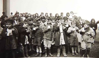 1950 Jul 1-Dec 31 AGBU distributing milk to Arm. Evangelical school students in Ainjar