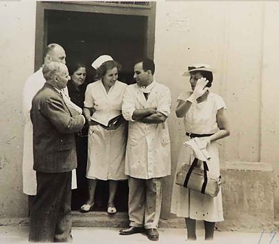 1950 Jun 22 AGBU Board member Miss Lila Karageozian with the Doctors and nurses at AGBU dispensary in Beirut