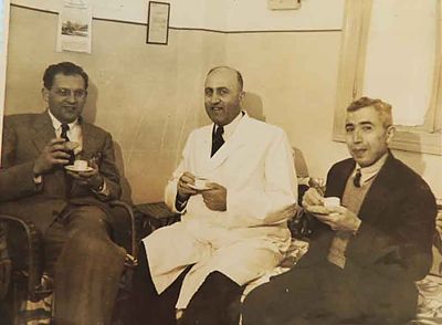 1950 Mar 25 Dr Pierre having coffee in AGBU Dispensary.