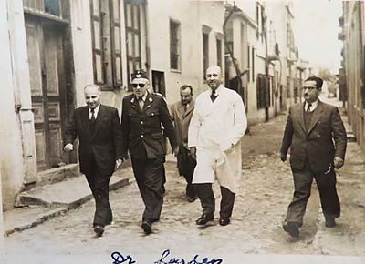 1950 Mar 28 Intl. Red cross repr Dr Larsen visiting the AGBU Dispensary neighborhood with Dr Y. Markarian and the Trustees